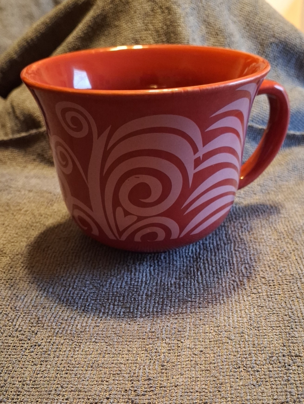 Red Ceramic Mug with White Swirl Pattern - Brand